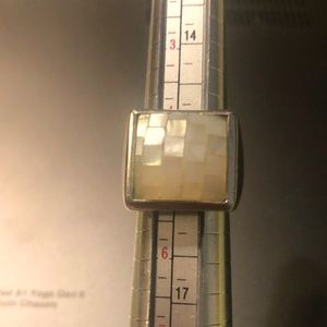A Lia Sophia ring mop squares silver tone ring.